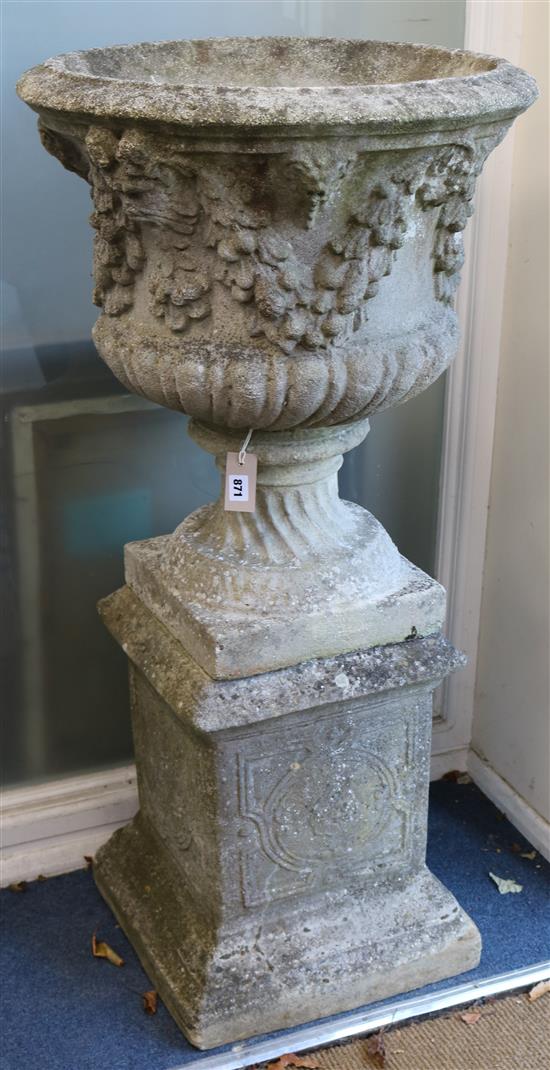 Pair of garden urns on pedestal bases W. approx. 60cm